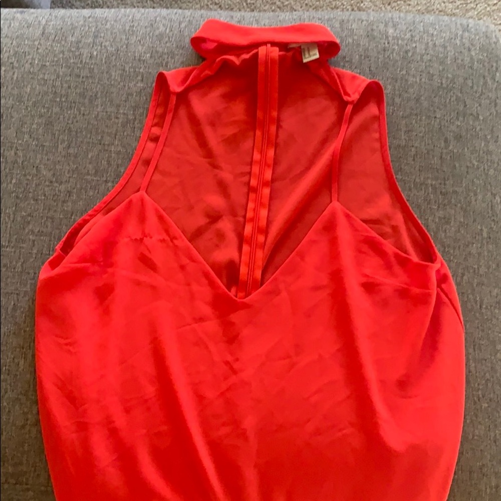 Red blouse and with cut out in front